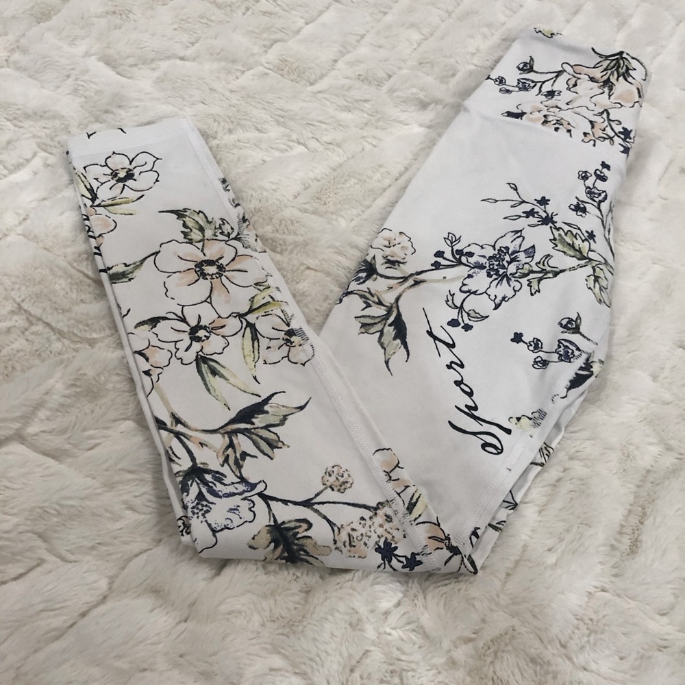 Victoria’s Secret size xsmall white multi-colored floral workout leggings